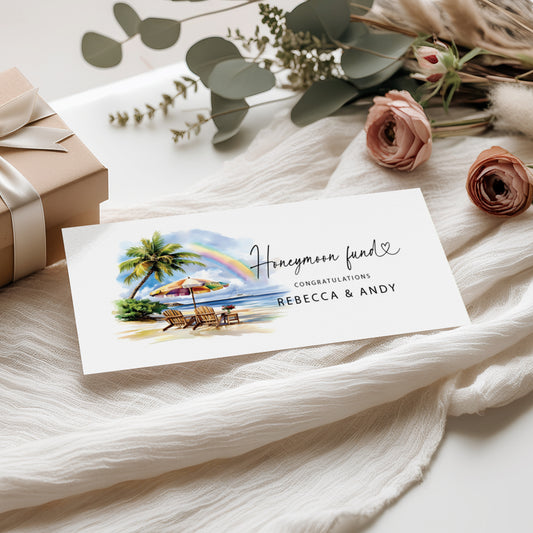 Honeymoon fund card with beach scene on white fabric