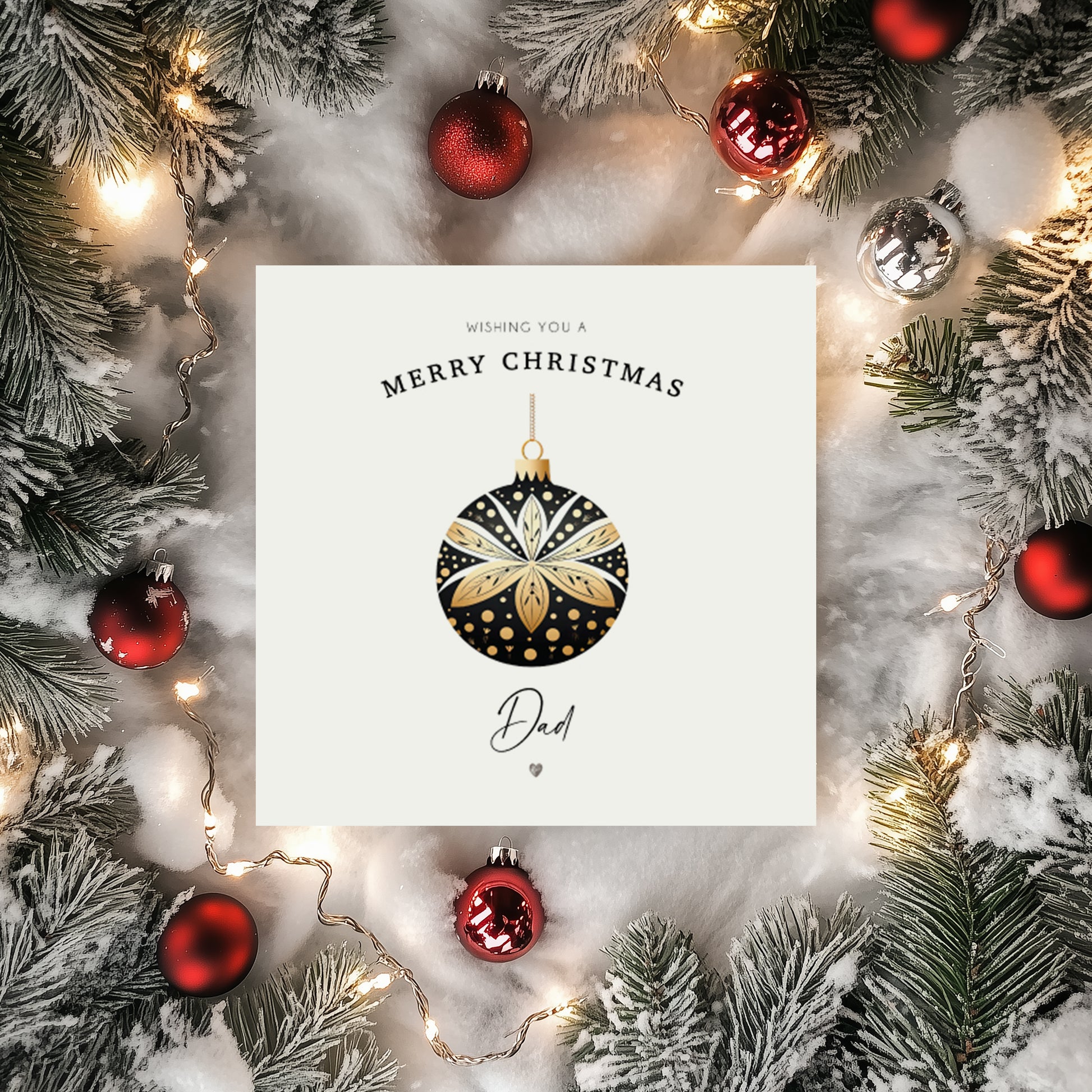 Christmas card with decorative gold and black ornament design with personalised text surrounded by festive decorations.