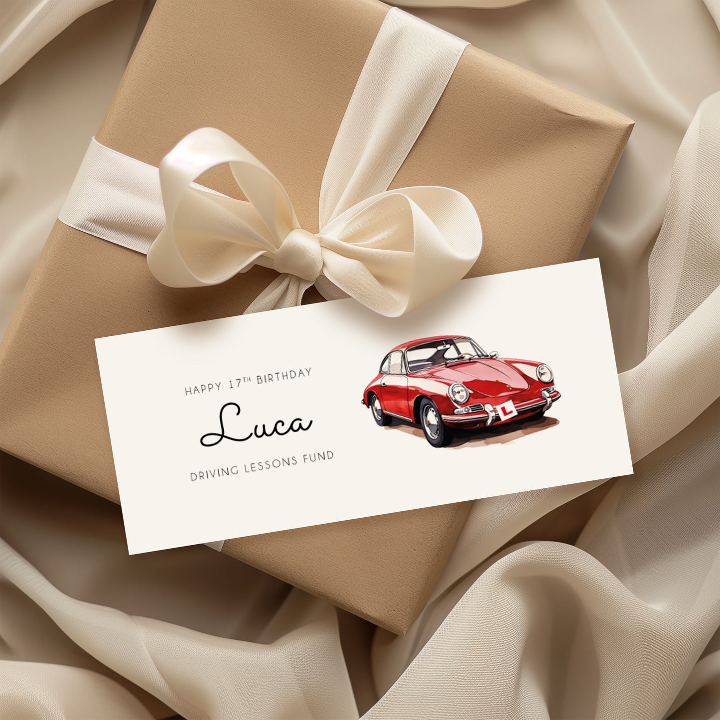 Hands holding a birthday money wallet. Text reads "Happy 17th Birthday (name) Driving Lessons Fund" Featuring a blue vintage red sports car Illustration with a L plate. 