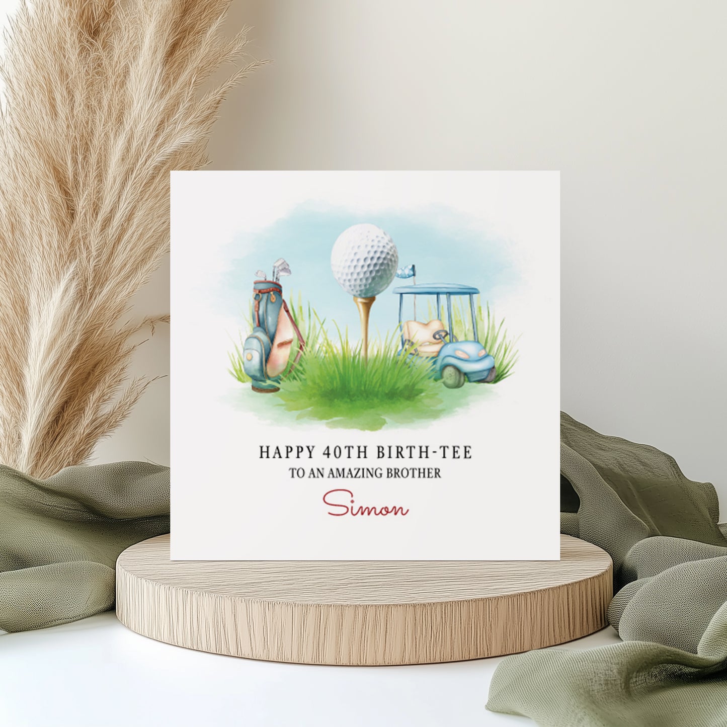 Greeting card with golf-themed illustration on a wooden stand with decorative elements.